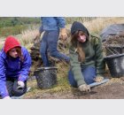 school pupils excavating